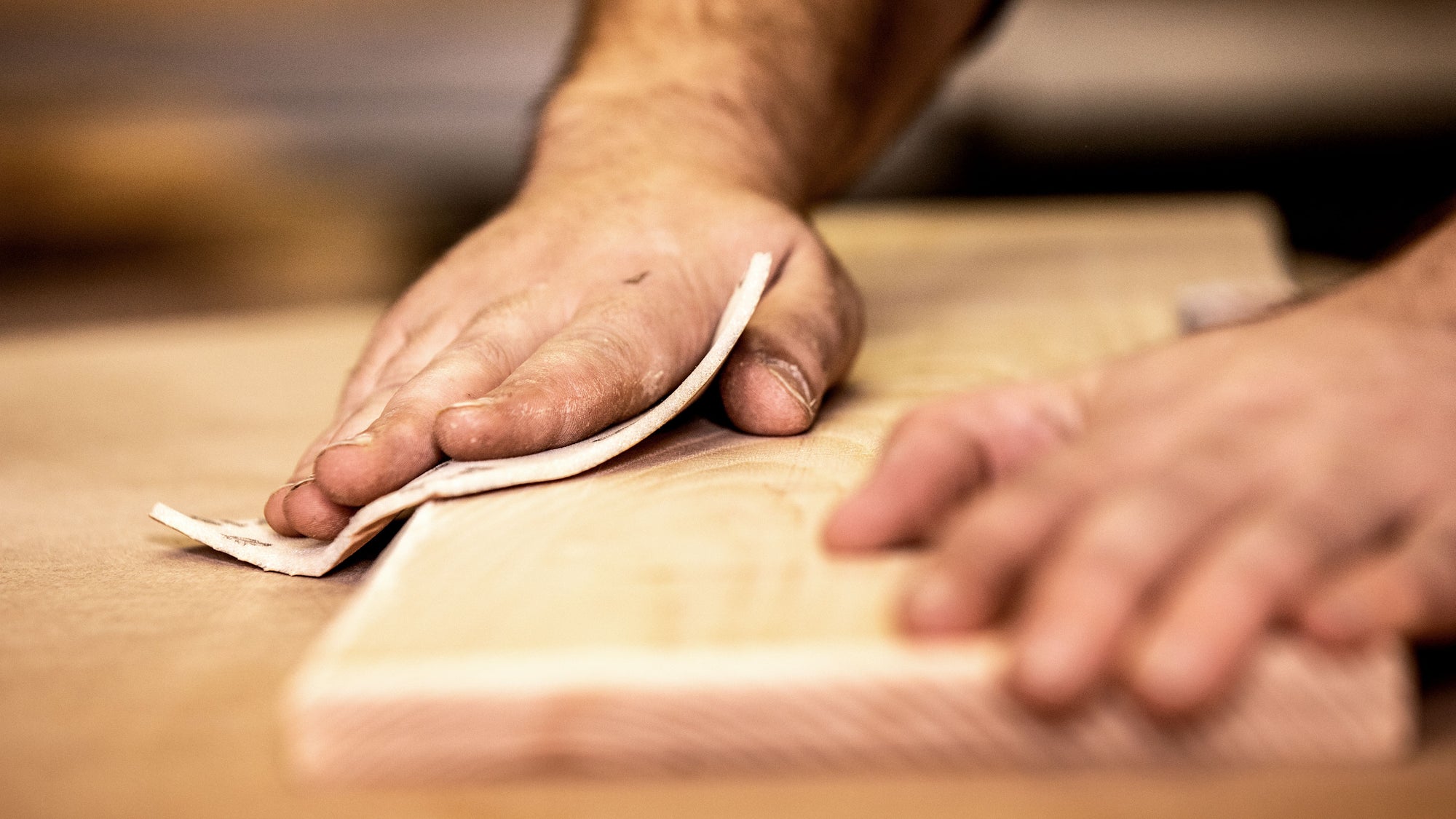 When Sandpaper Smooths A Piece Of Wood?